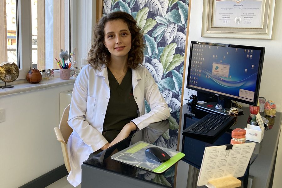 Dr. Dt. Tuba Akcakus Battal at dental office — specialist prosthodontist consultation